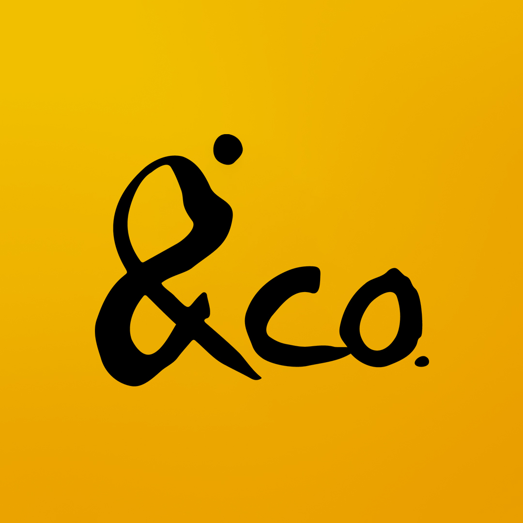 Logo de l'école de danse Esperluette. Logo noir sur fond jaune, composé du symbole typographique esperluette, des lettres C, O et d'un point. L'esperluette représente une personne qui danse.